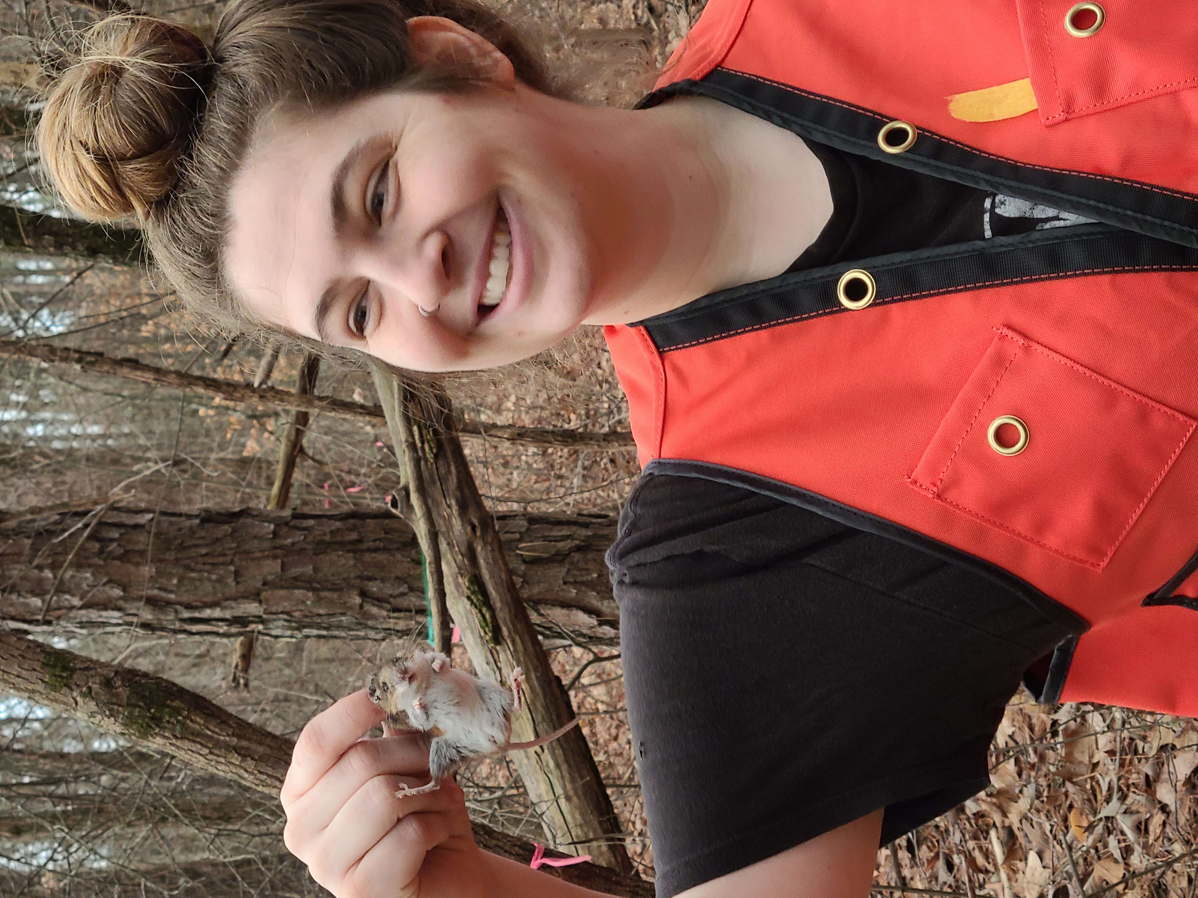 Bri holding a mouse.