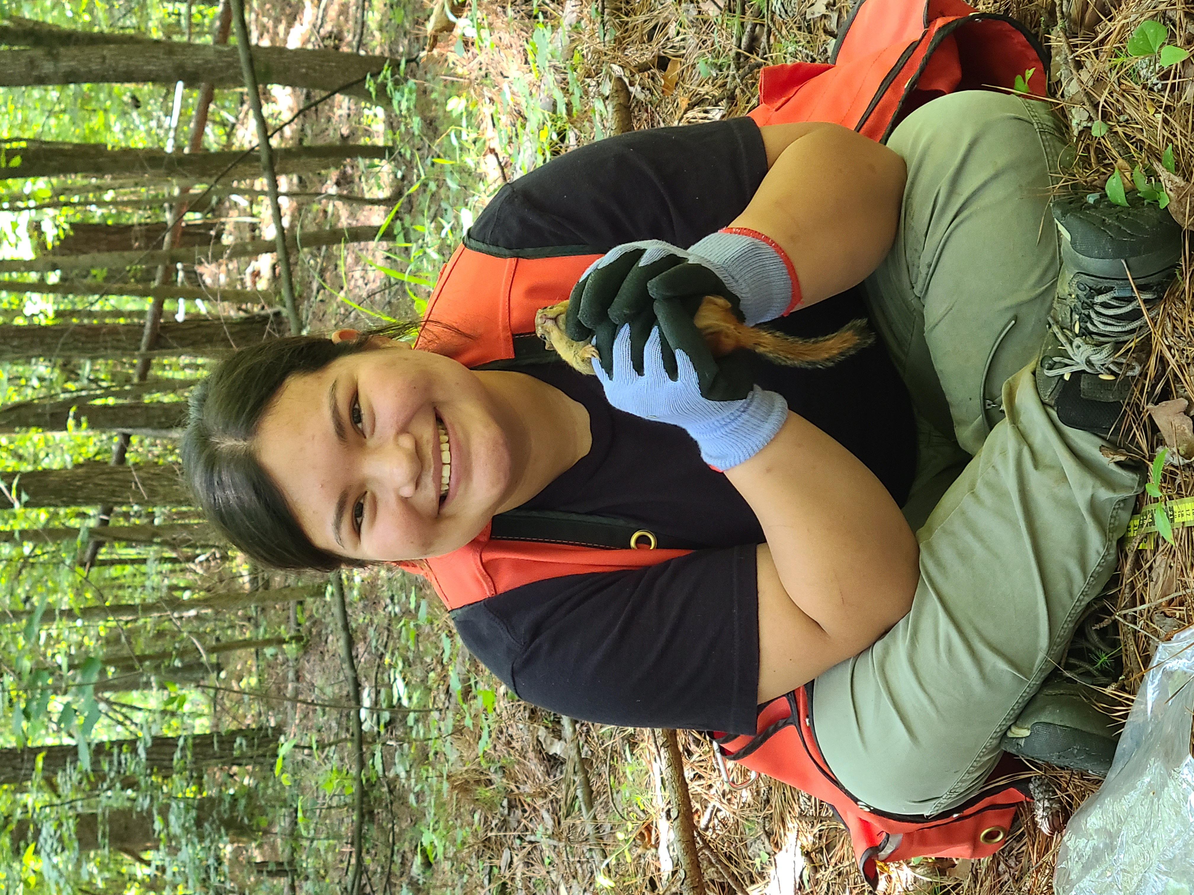 Leslie holding a chipmunk.